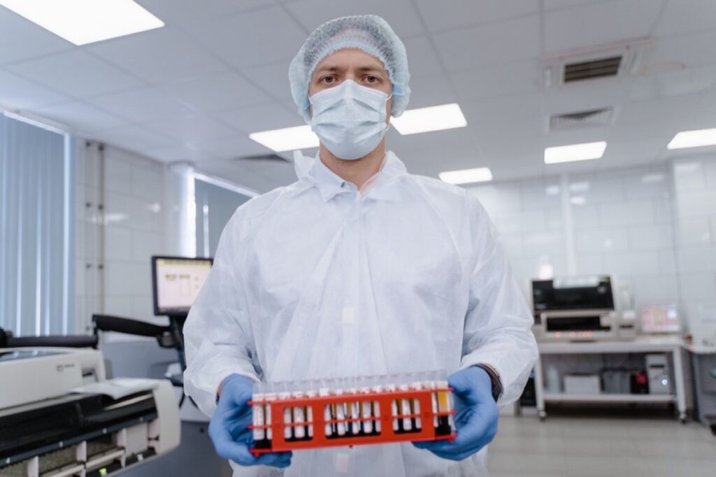 Laboratory technician testing dog probiotic supplements for shelf-life stability